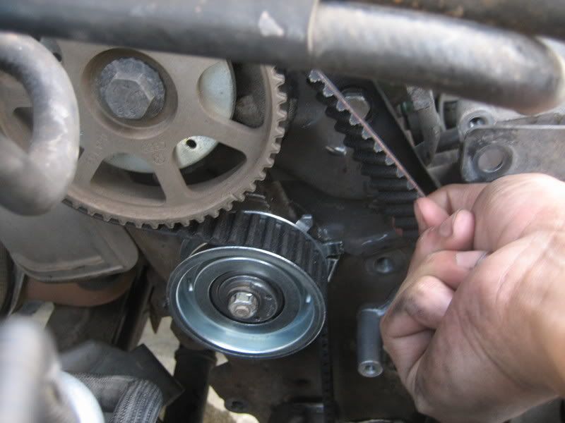 what is a timing belt tensioner