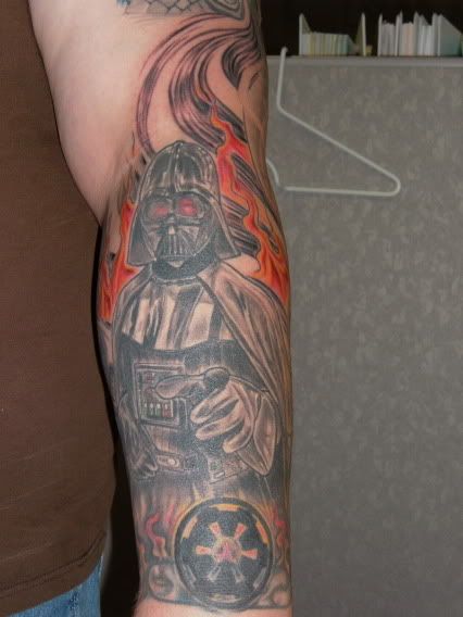  an Imperial Cog and some flames. Tattoo your kids name on you, 
