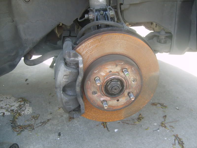 How to remove axle nut on a honda