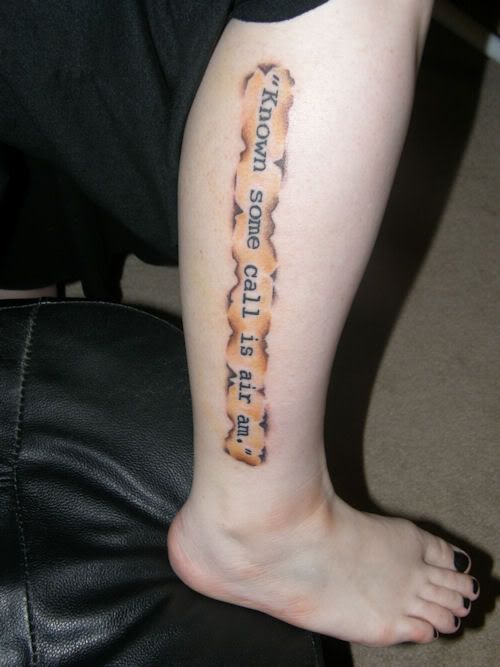 Latin writing tattoo for the phrase "By faith alone". latin phrase tattoo