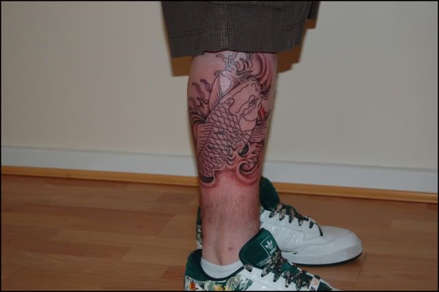 That is a sweet Tattoo Jake love it and i am not a huge fan of koi fish
