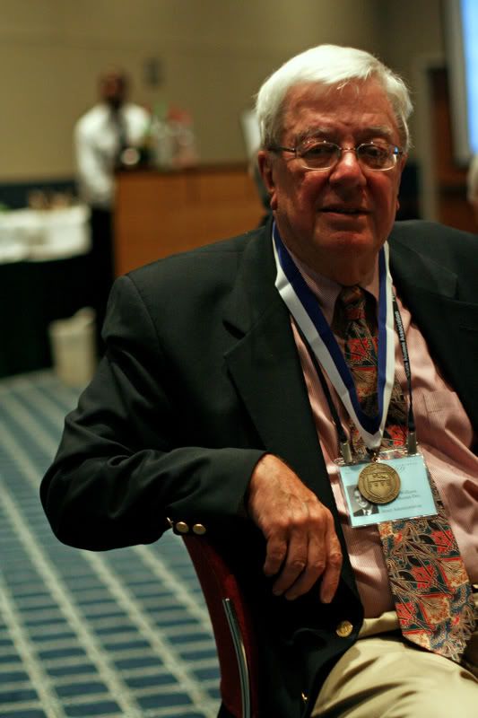 IMAGE: http://i5.photobucket.com/albums/y197/JtheVGKing/Penn%20State%20Pioneers/guywithmedalchillin1.jpg