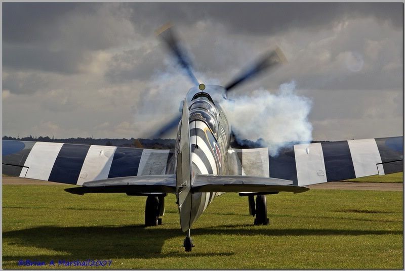 http://i5.photobucket.com/albums/y200/penpusher/Duxford%20Retro/15Sep.jpg