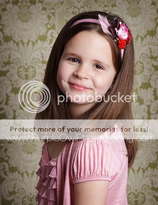  of flowers consisting of satin rose and carnation style flowers 