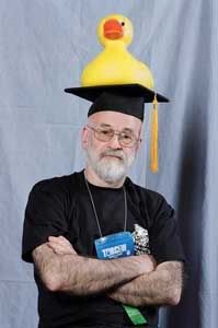 Man in black with duckie on top!